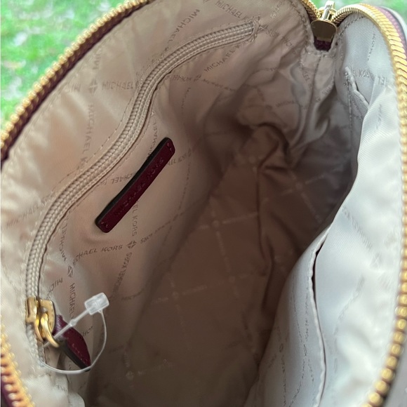 Michael Kors crossbody in an eggplant color - Picture 3 of 5